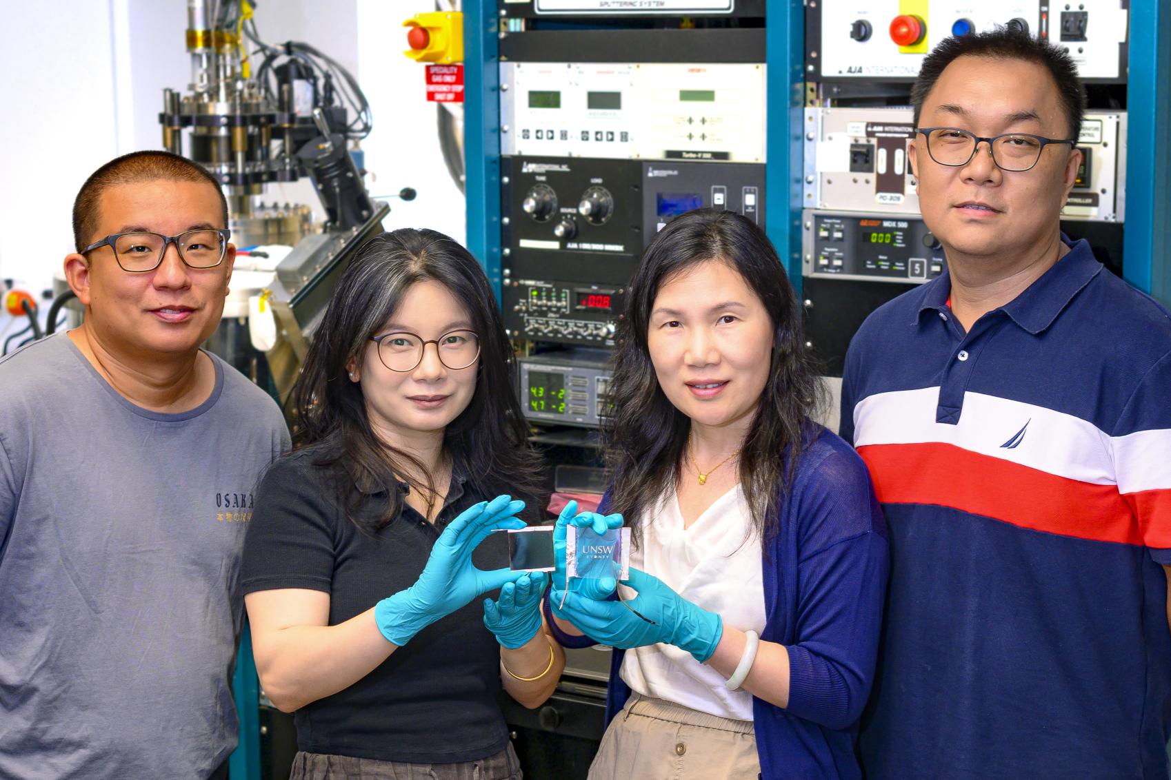 Photo of Xiaojing Hao Team UNSW standing together in a laboratory.