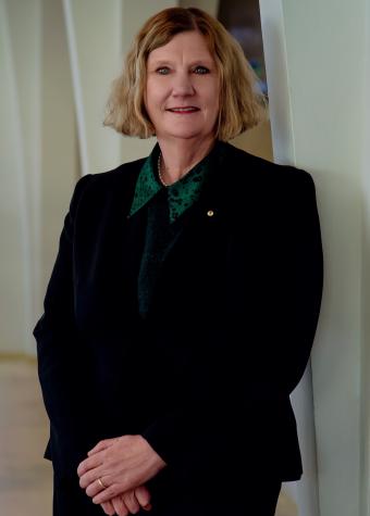 Image of Catherine Roberts standing looking at the camera